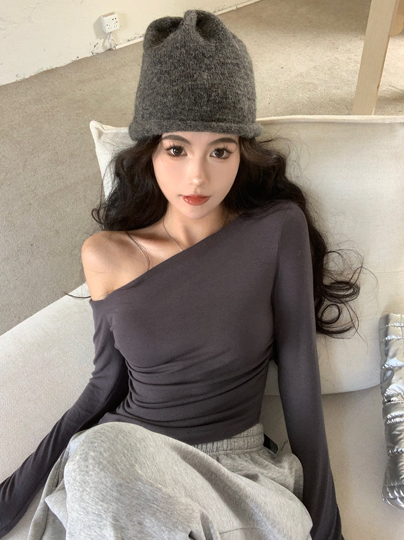 純欲性感辣妹風不規則露肩上衣