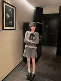 小香風蝴蝶結花邊百褶半身裙套裝
